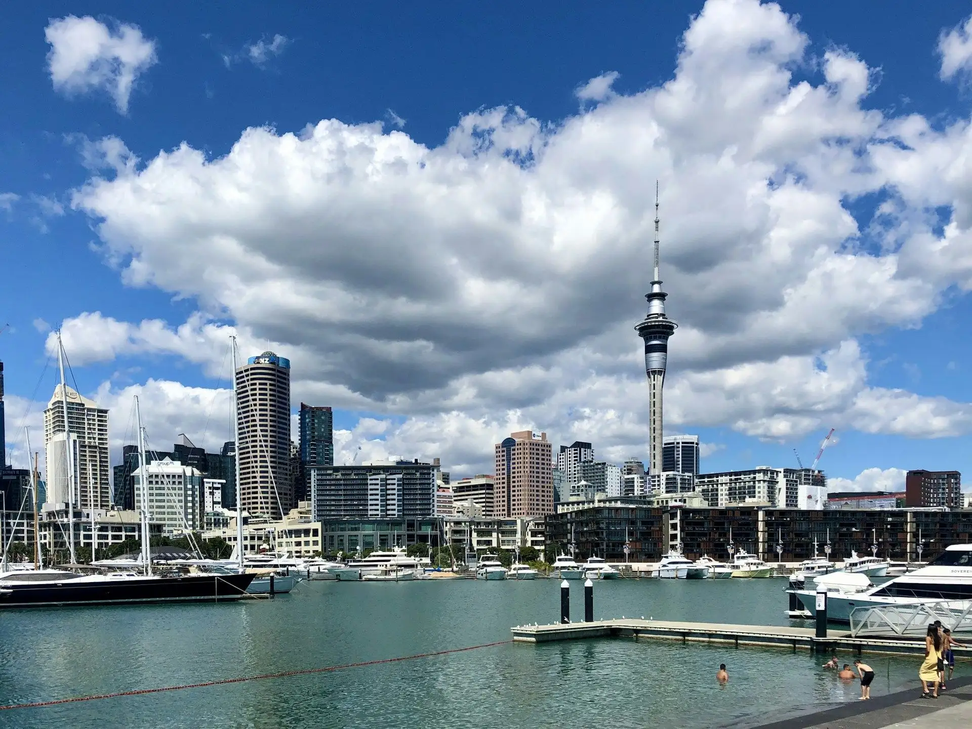 Viaduct Harbour and the Sky Tower under billowing cloud