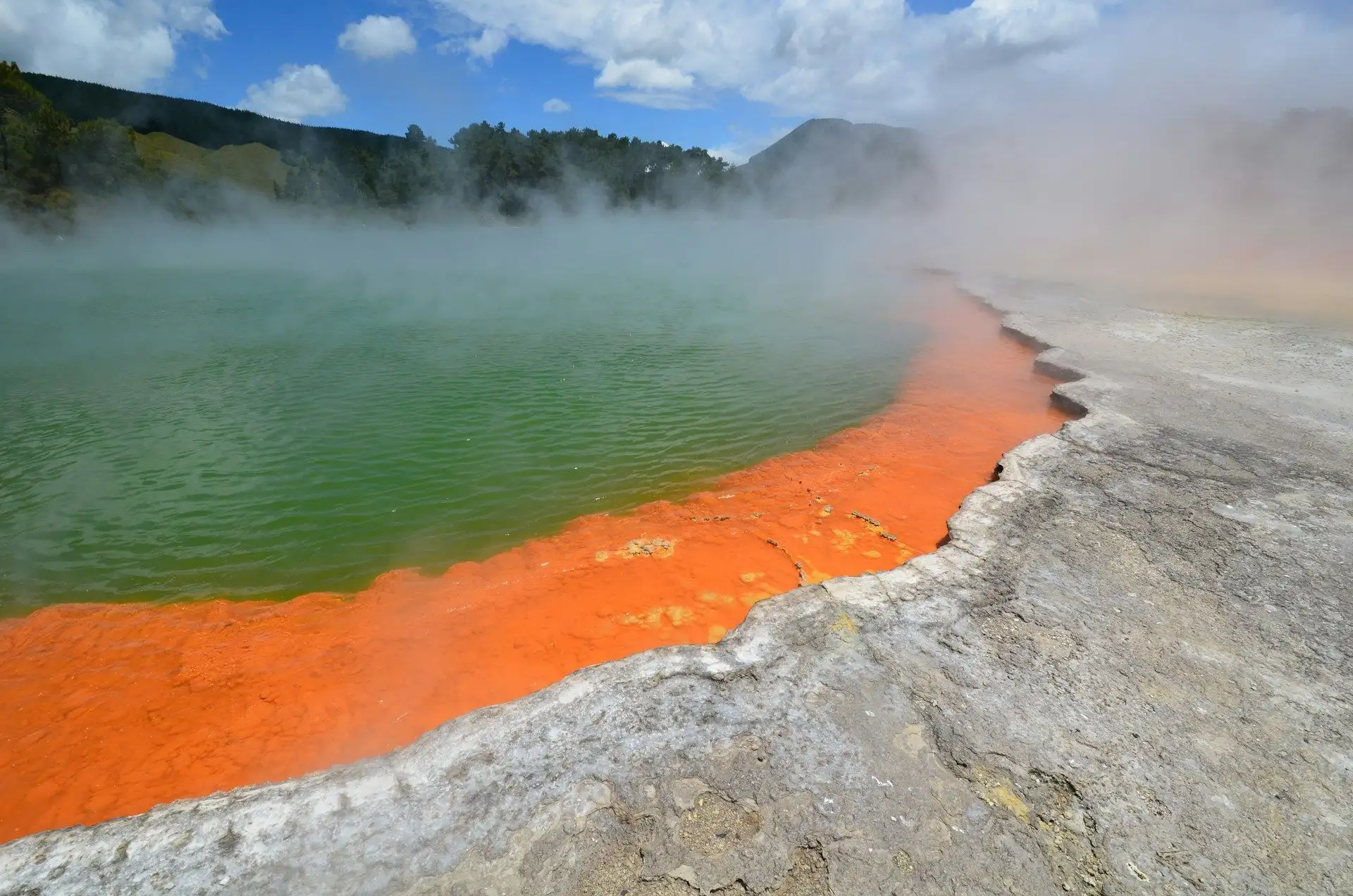 The orange rim and green steaming water of Champagne Pool at Wai-O-Tapu